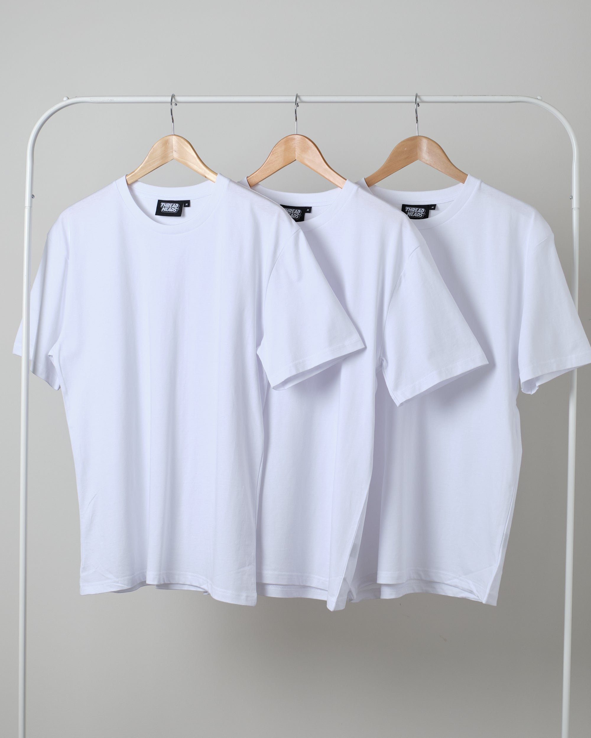 Pack of white t shirts best sale